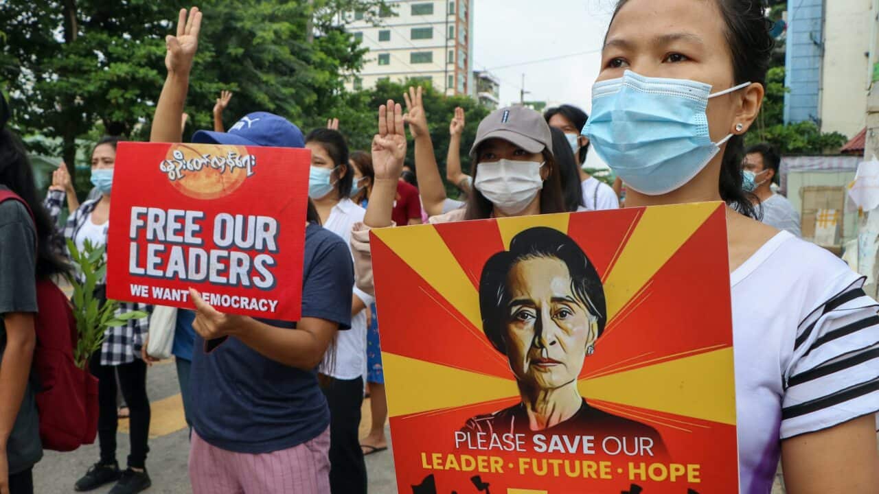 Anti-coup protesters march along a street in Yangon, Myanmar, on Saturday, 24 April, 2021.
