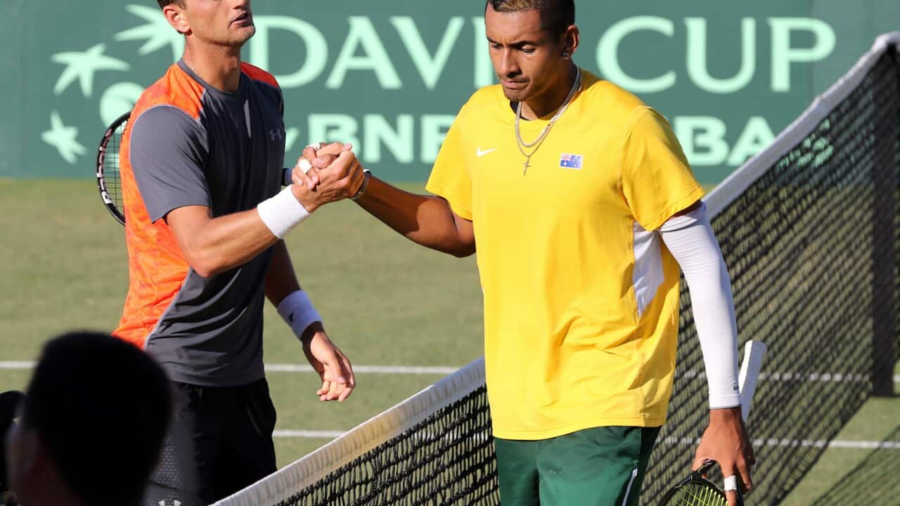 Kazakhstan's Aleksandr Nedovyesov and Australia's Nick Kyrgios at the Davis Cup quarter final between Australia and Kazakhstan