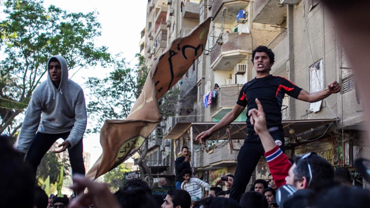 Supporters of Egypt's ousted President Mohamed Morsi march in Cairo