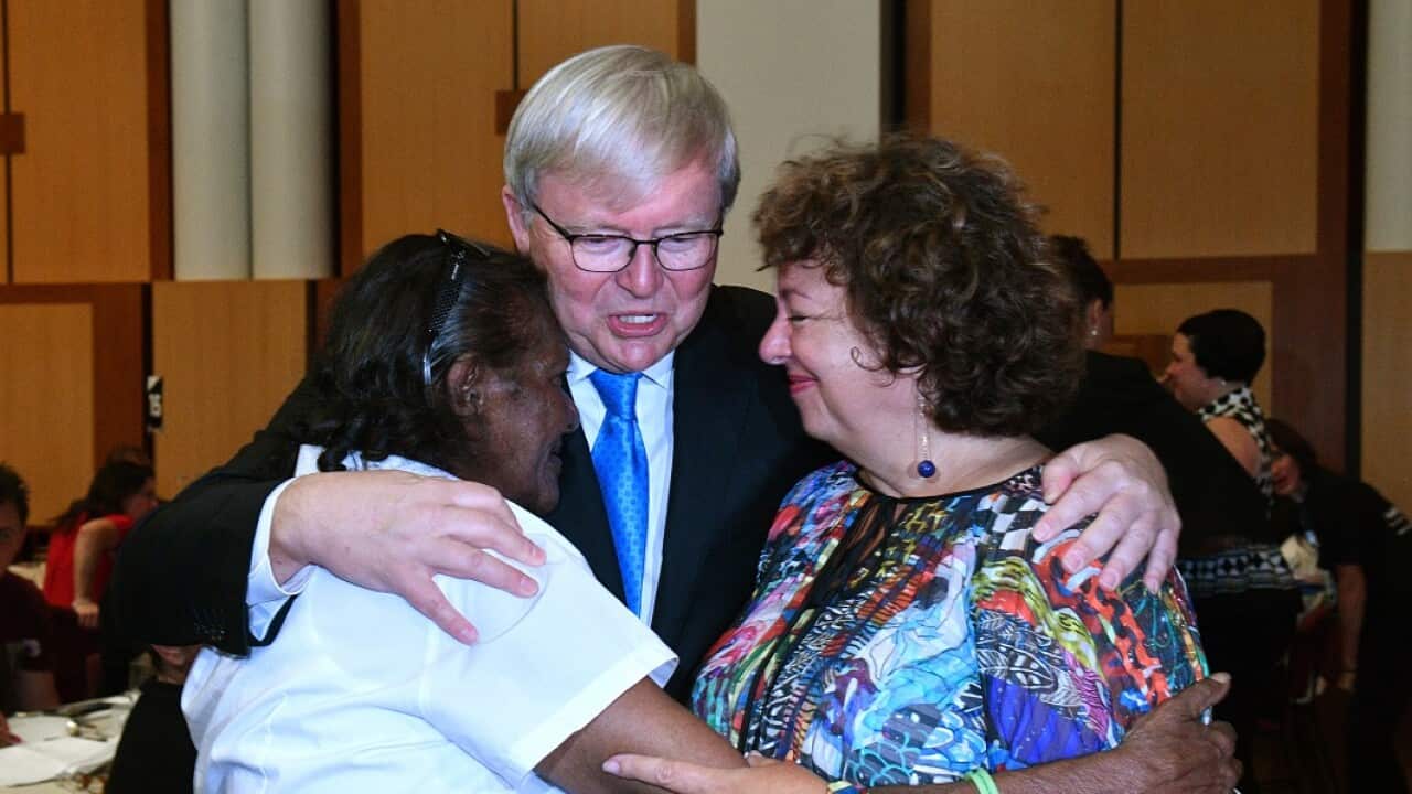 Kevin Rudd and wife Therese hug stolen generation Elaine Randall at a breakfast to mark the 10th anniversary of the National Apology.