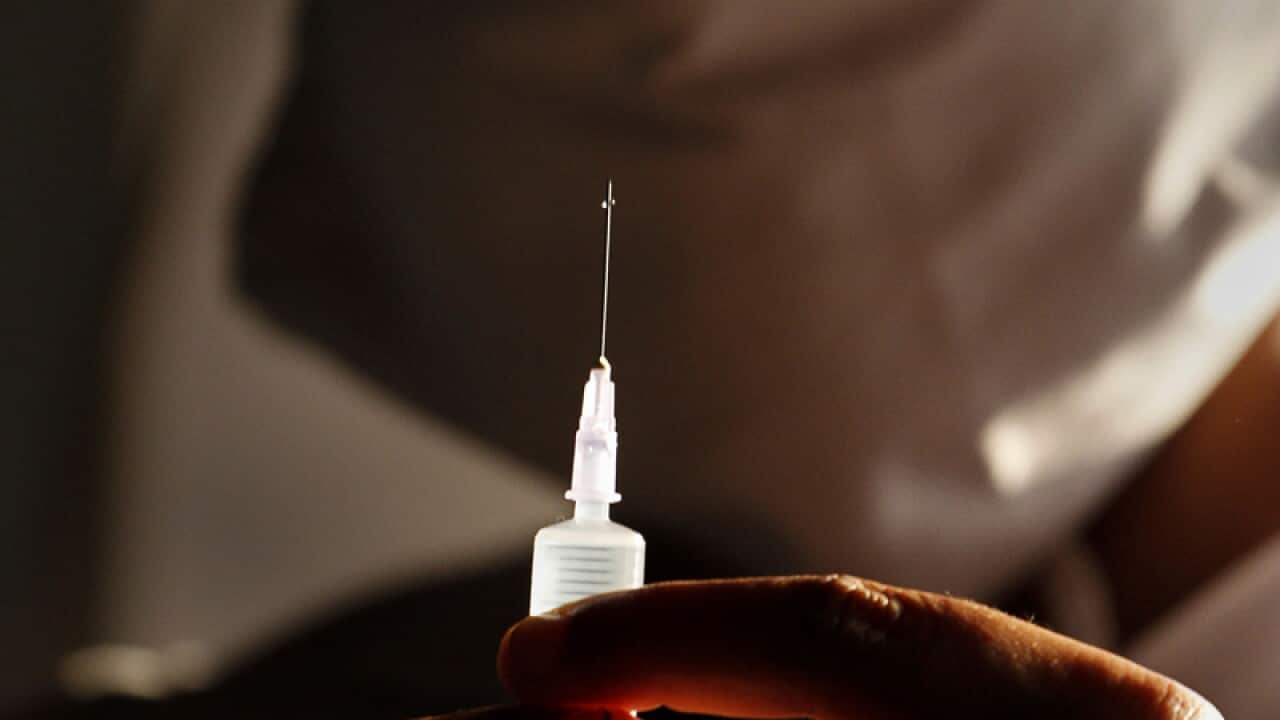 A nurse prepares an injection to administer to a tuberculosis patient. A US study says about a million children, double the previous estimate, fall ill with TB every year. (AAP)