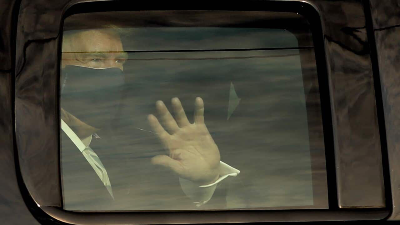 US President Donald Trump in a motorcade outside Walter Reed Medical Center