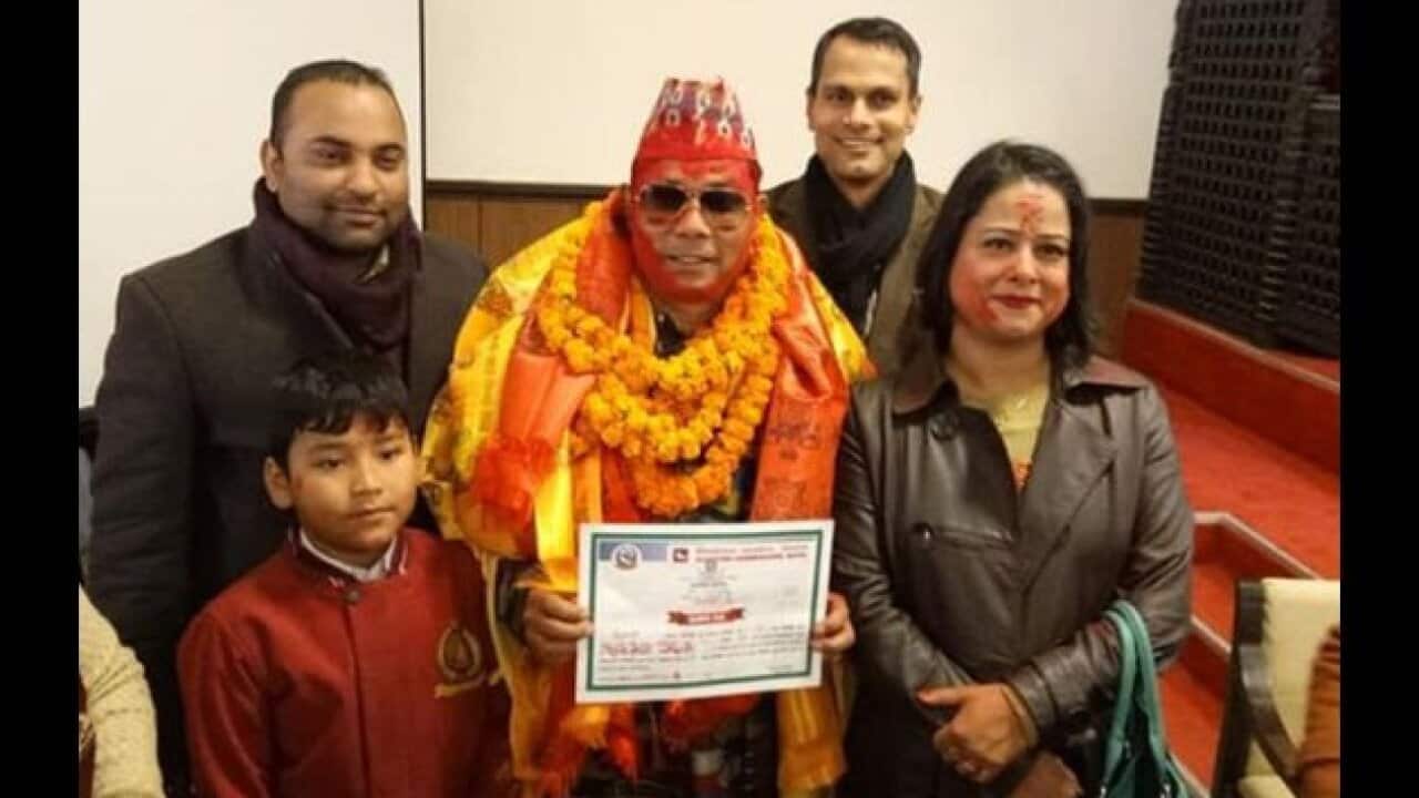 Resham Chaudhary (center) recently took an oath as a member of parliament.