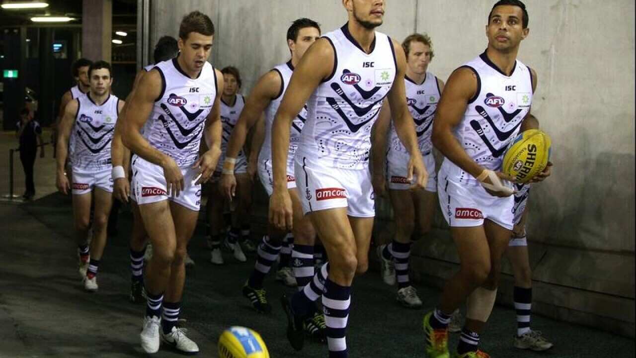 A file image of Michael Johnson and Danyle Pearce of the Dockers.