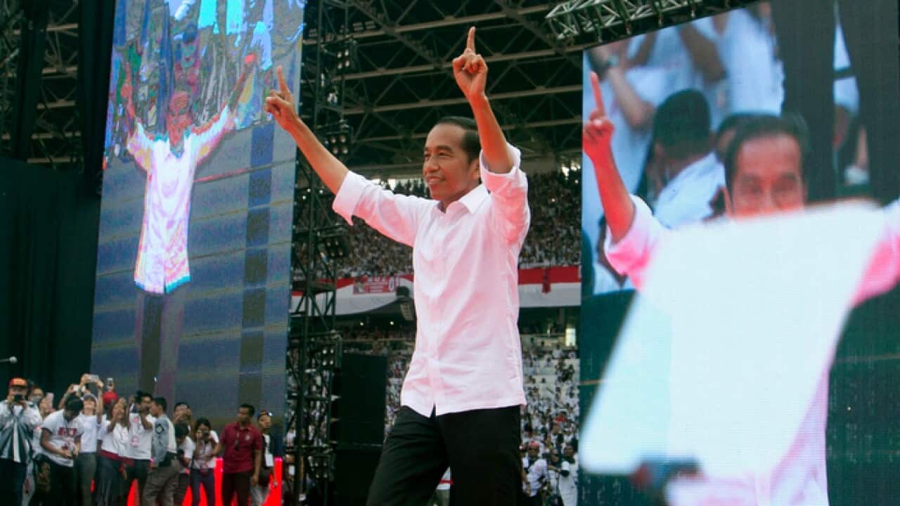 Indonesian presidential candidate Joko Widodo, center, during a campaign rally at Gelora Bung Karno Stadium in Jakarta, Indonesia.