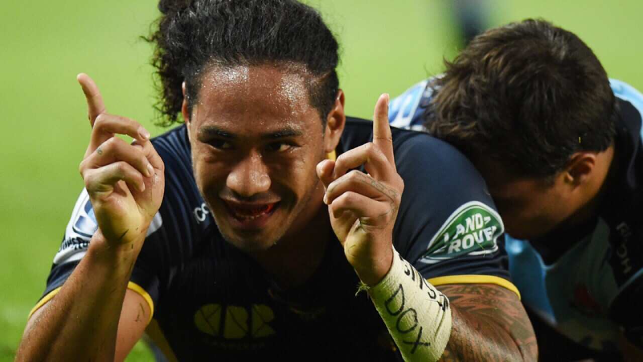 Joe Tomane of the Brumbies celebrates his try