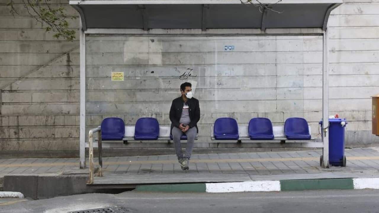 A man wearing a face mask in Tehran.