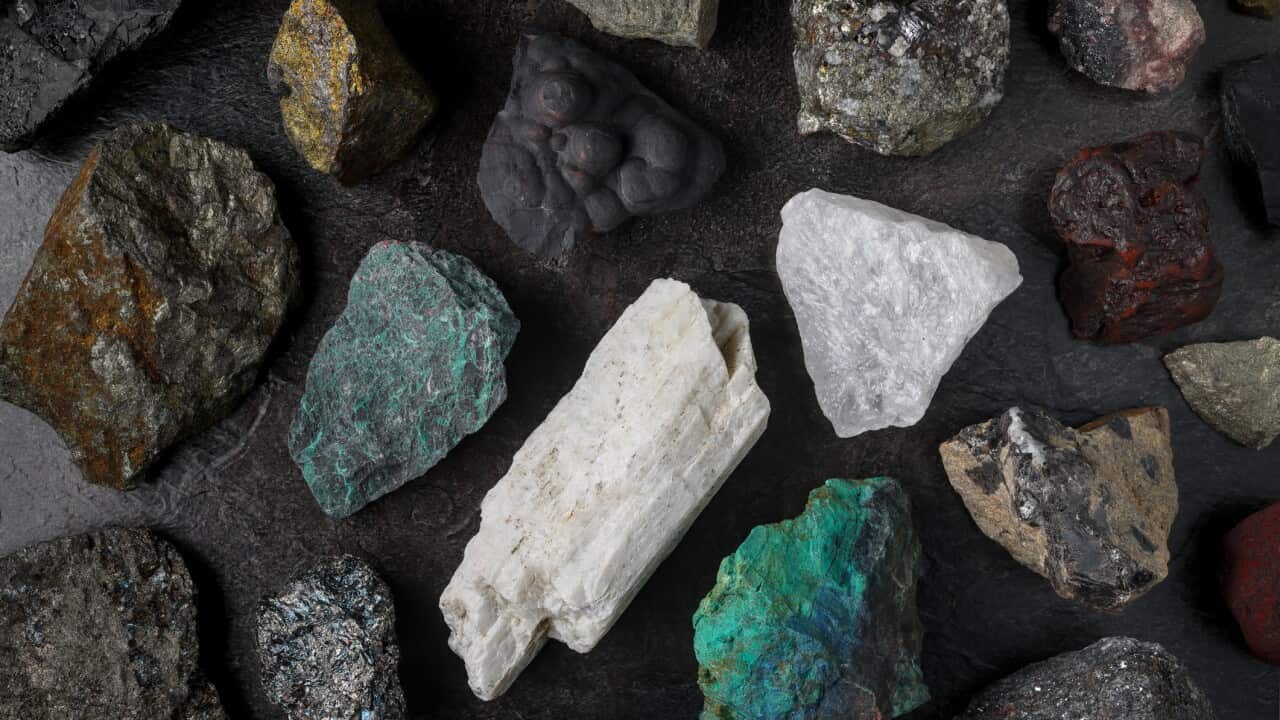 Mixture of critical minerals (United States of America definition), or critical raw materials (European Union definition). Flatlay on slate background