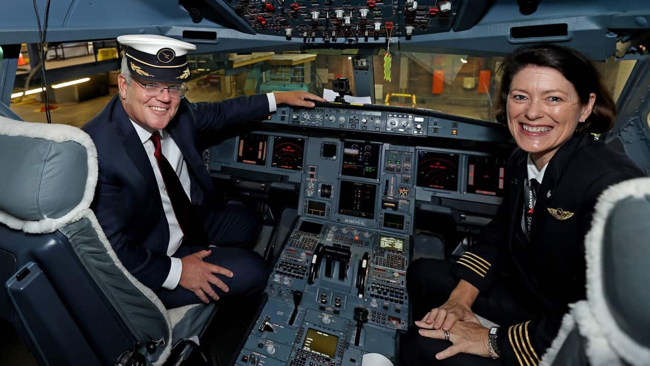 Scott Morrison and Qantas Pilot Captain Debbie Slade in the cockpit of an Airbus A330