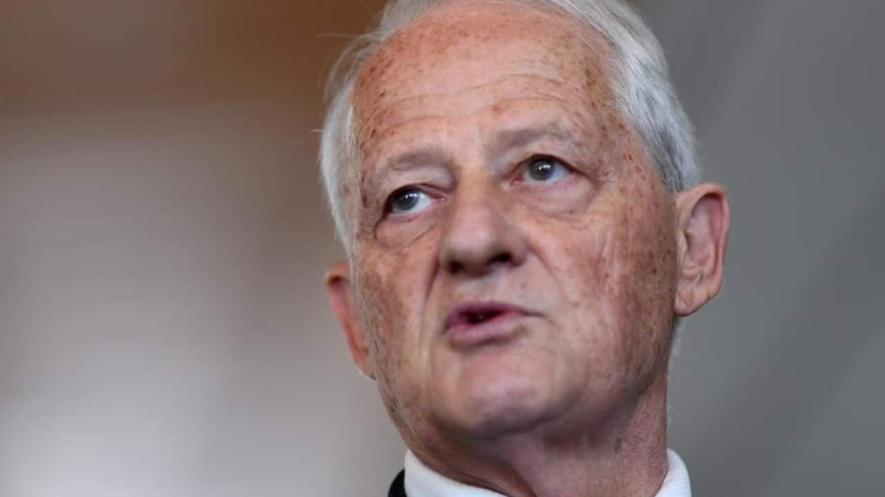 Phillip Ruddock speaks to the media