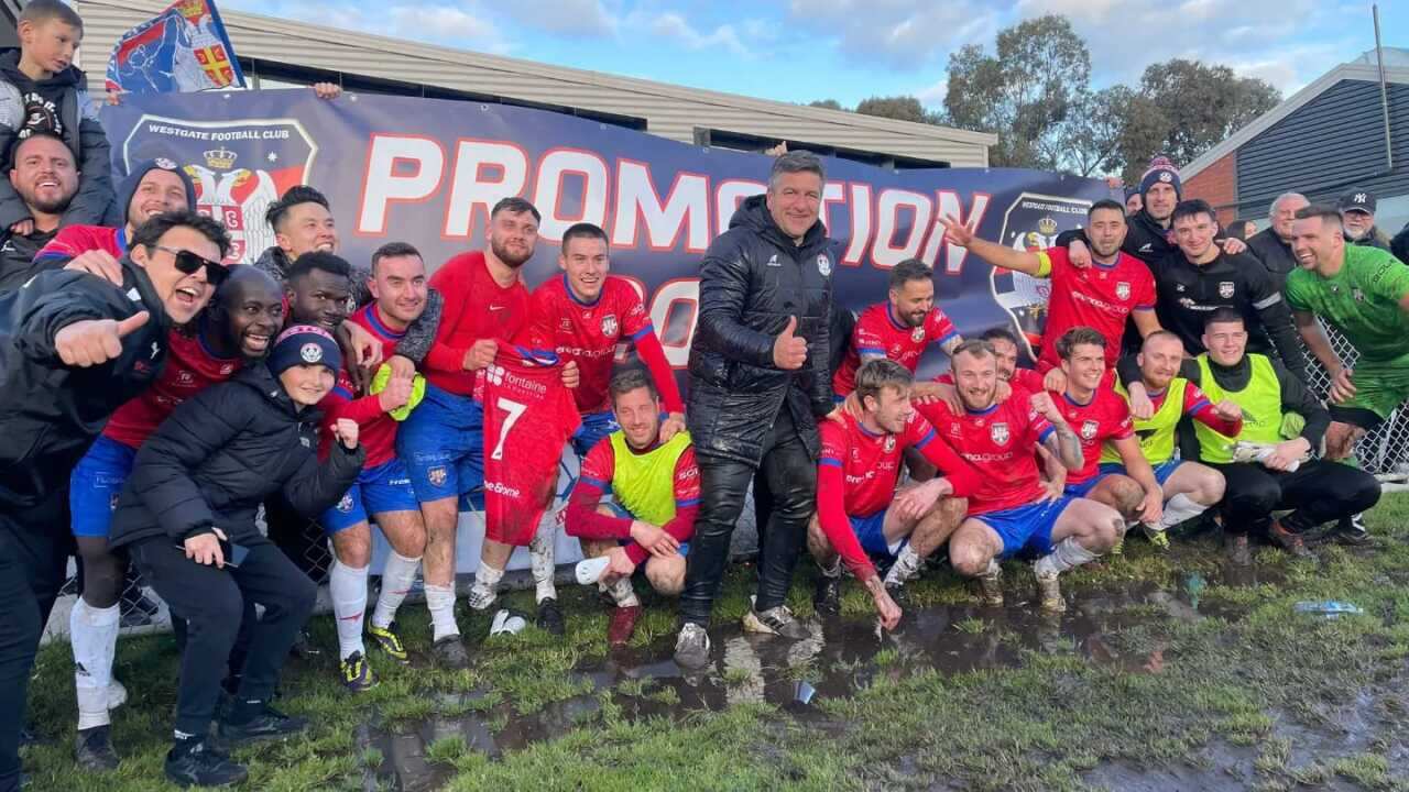 Westgate Sindjelic players and coaches celebrate promotion to the State League One in Victoria.jpg