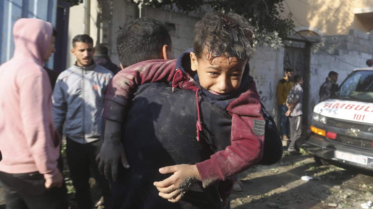 Palestinians evacuate wounded in Israeli bombardment