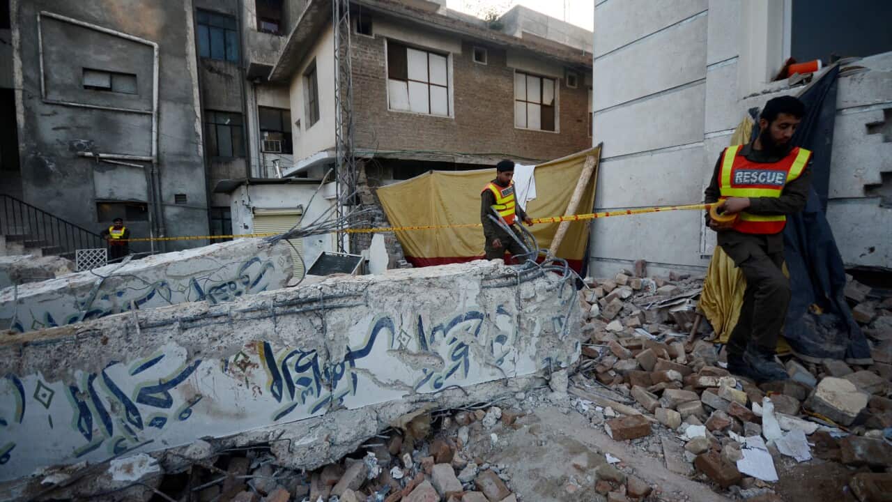 A view of damage from the suicide bombing at a mosque in Peshawar