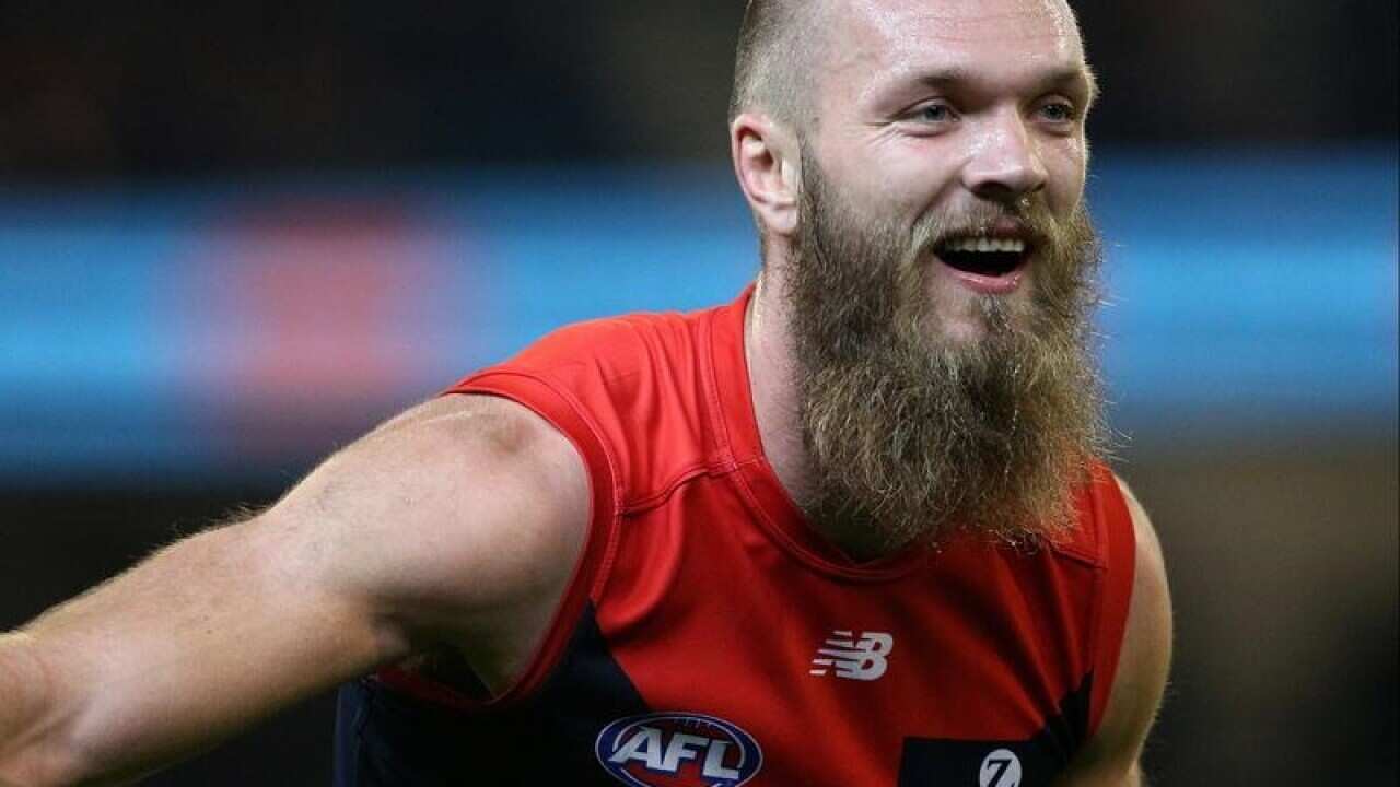 A file image of Max Gawn of the Demons laughing during a match.