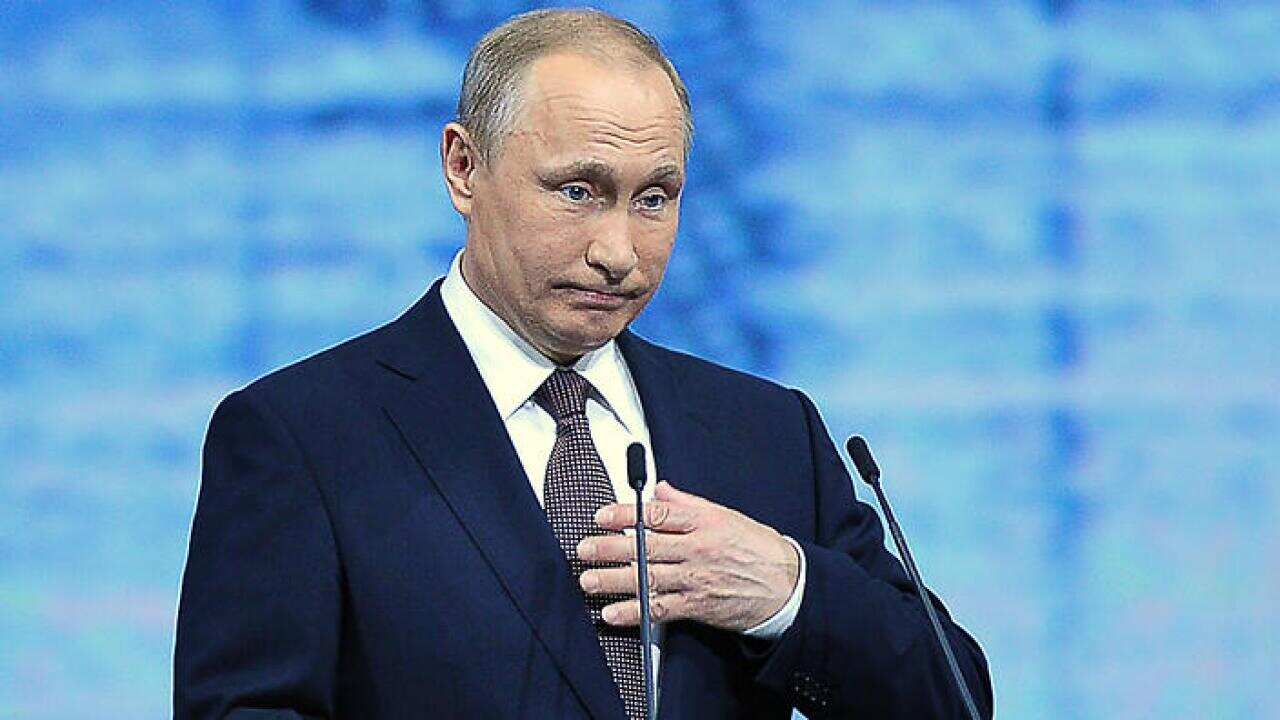 A visitor stands outside the entrance to the Russian Consulate in Seattle (AAP)