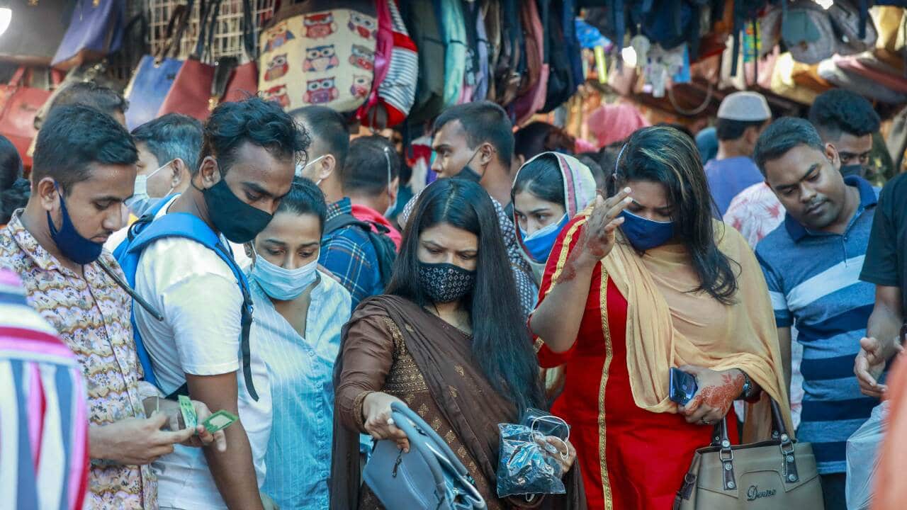 Bangladeshi people throng a market without caring for physical distancing crucial for checking coronavirus (COVID-19) spread, in Dhaka, Bangladesh, August 13, 2021. Photo by Kanti Das Suvra/ABACAPRESS.COM.