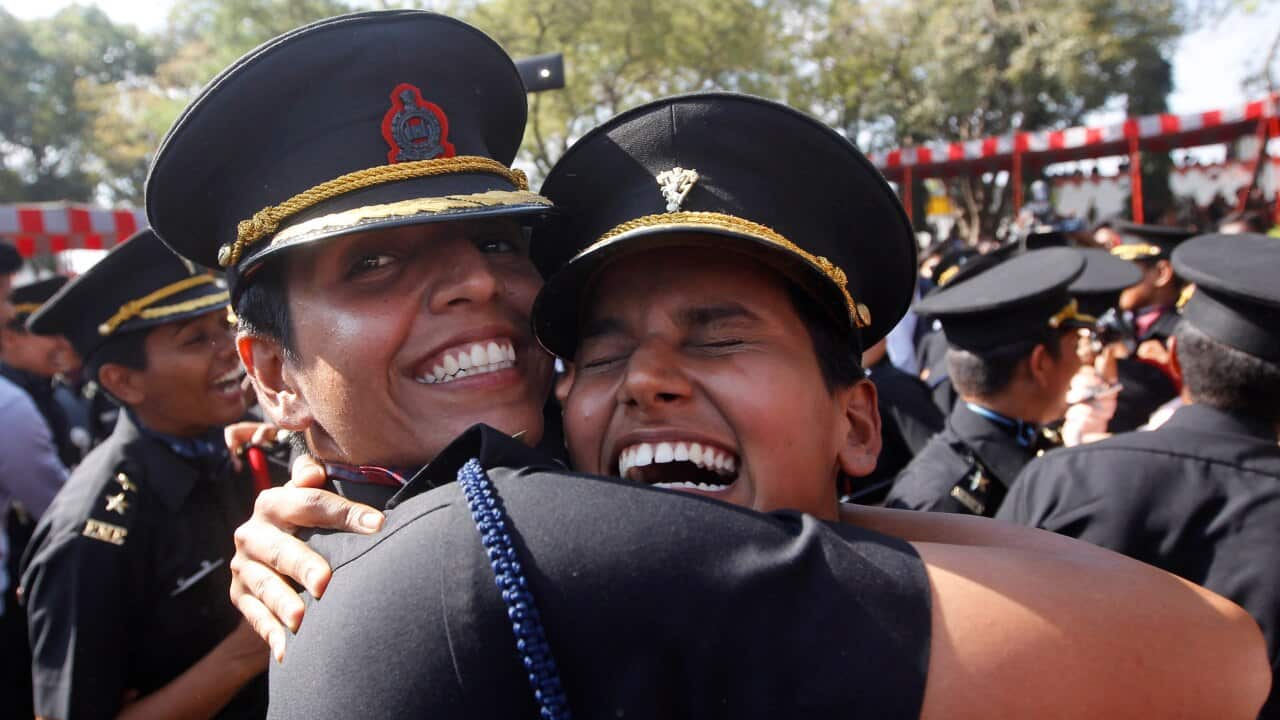 Cadets celebrate after graduating at the Indian Army's Officer Training Academy in Chennai