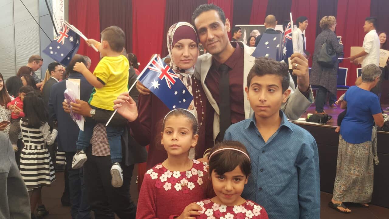 family receiving the citizenship