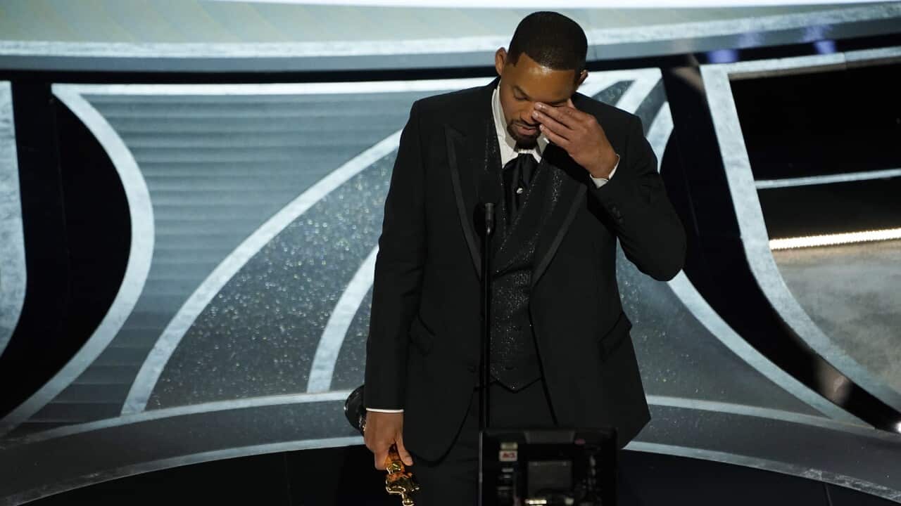 Will Smith wipes away tears during his acceptance speech for Best Actor at the Oscars on 27 March 2022.