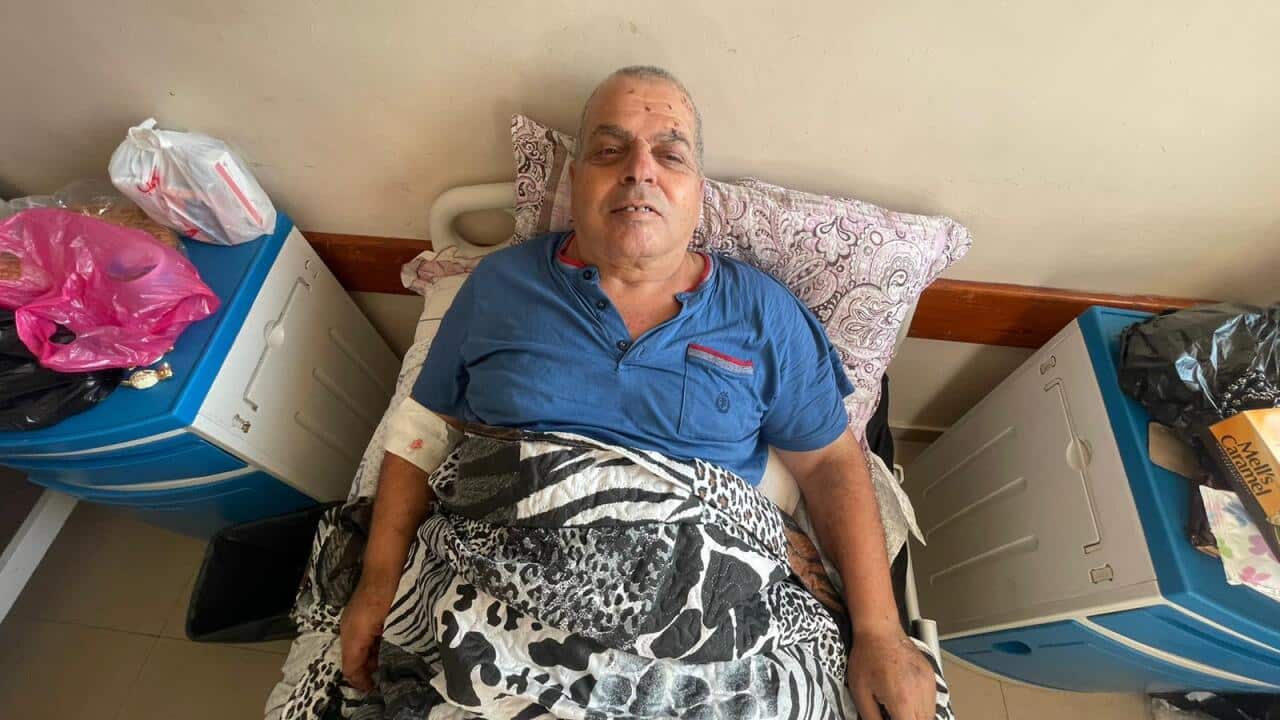 الجريح غسان أبو رمضان في قطاع غزة