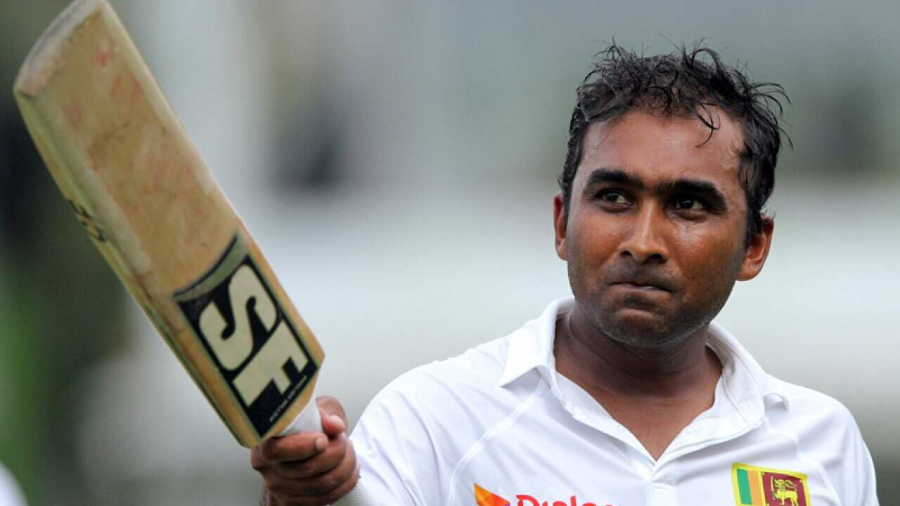 Sri Lankan cricketer Mahela Jayawardene celebrates his century