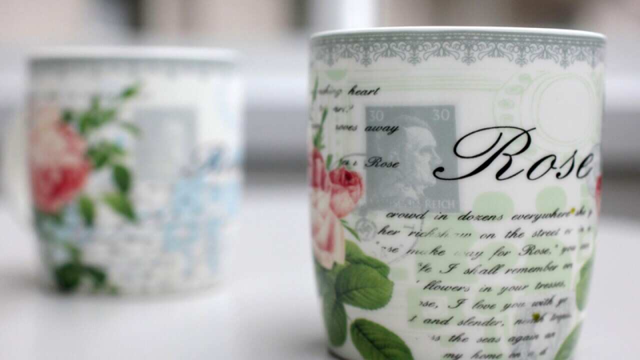 Coffee cups with a small Hitler portrait