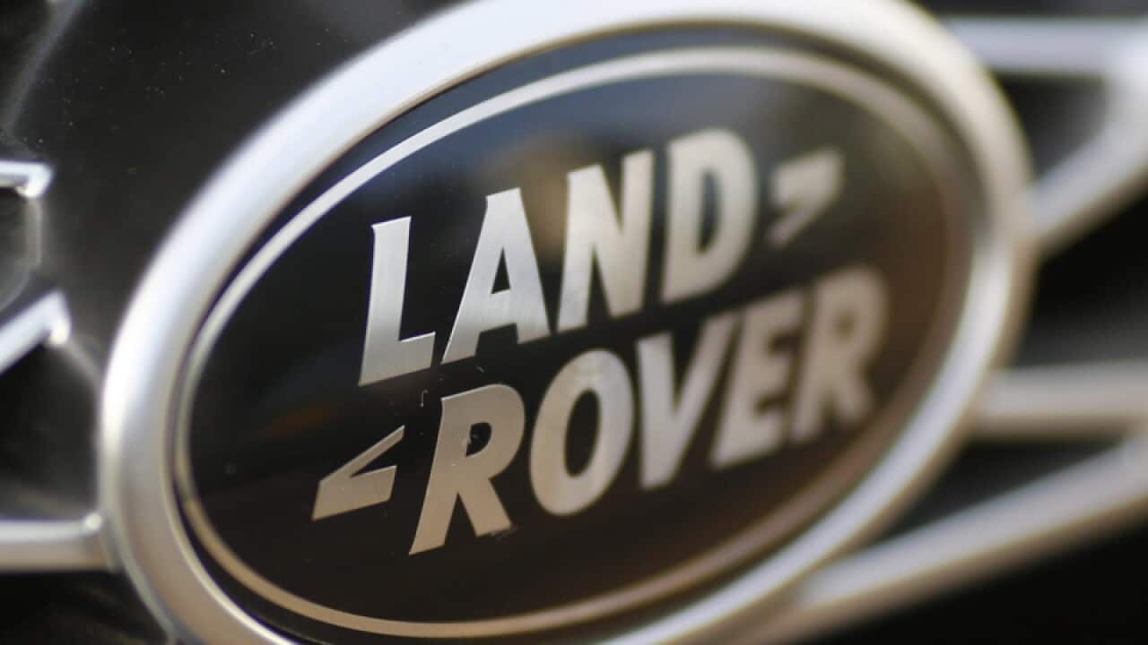 Land Rover badge on the grill of a car