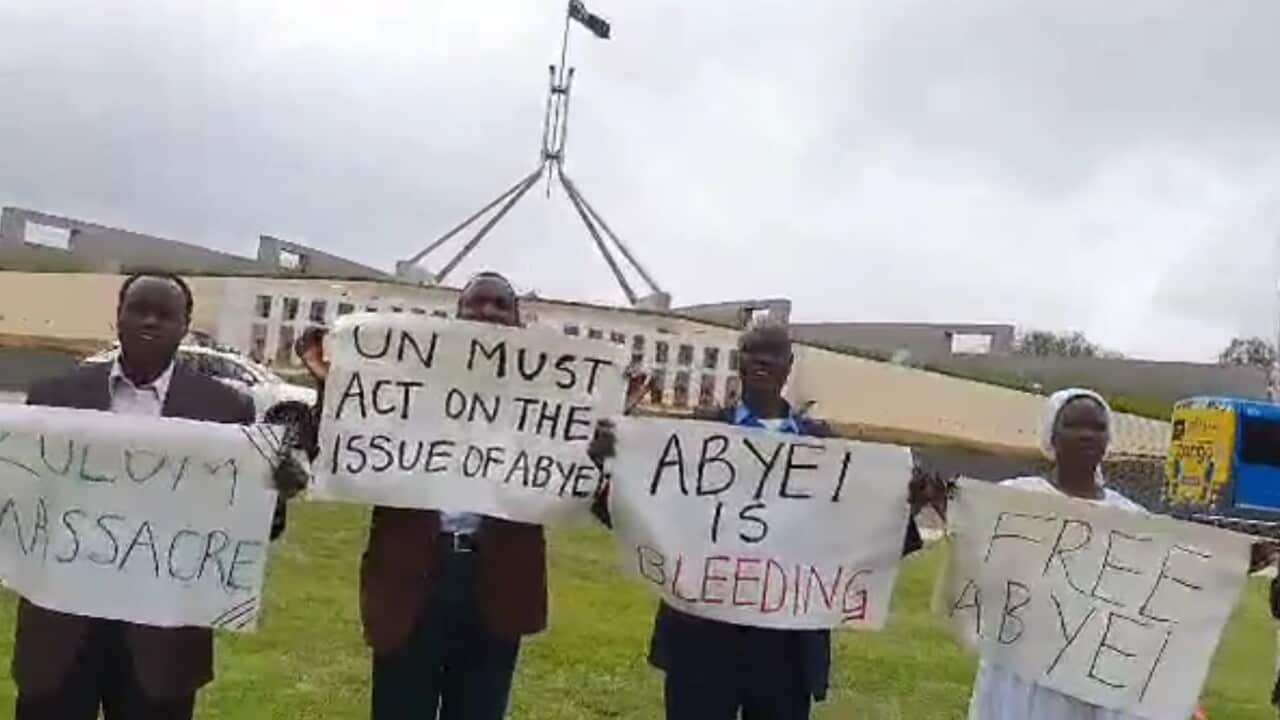 Members of Abyei Community in standing outside Australian Parliament
