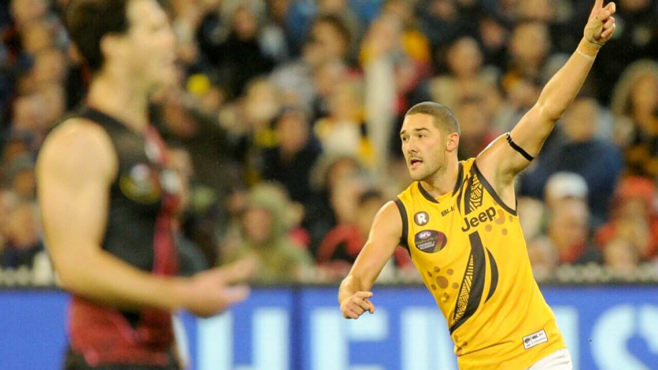 Shaun Grigg of the Tigers celebrates
