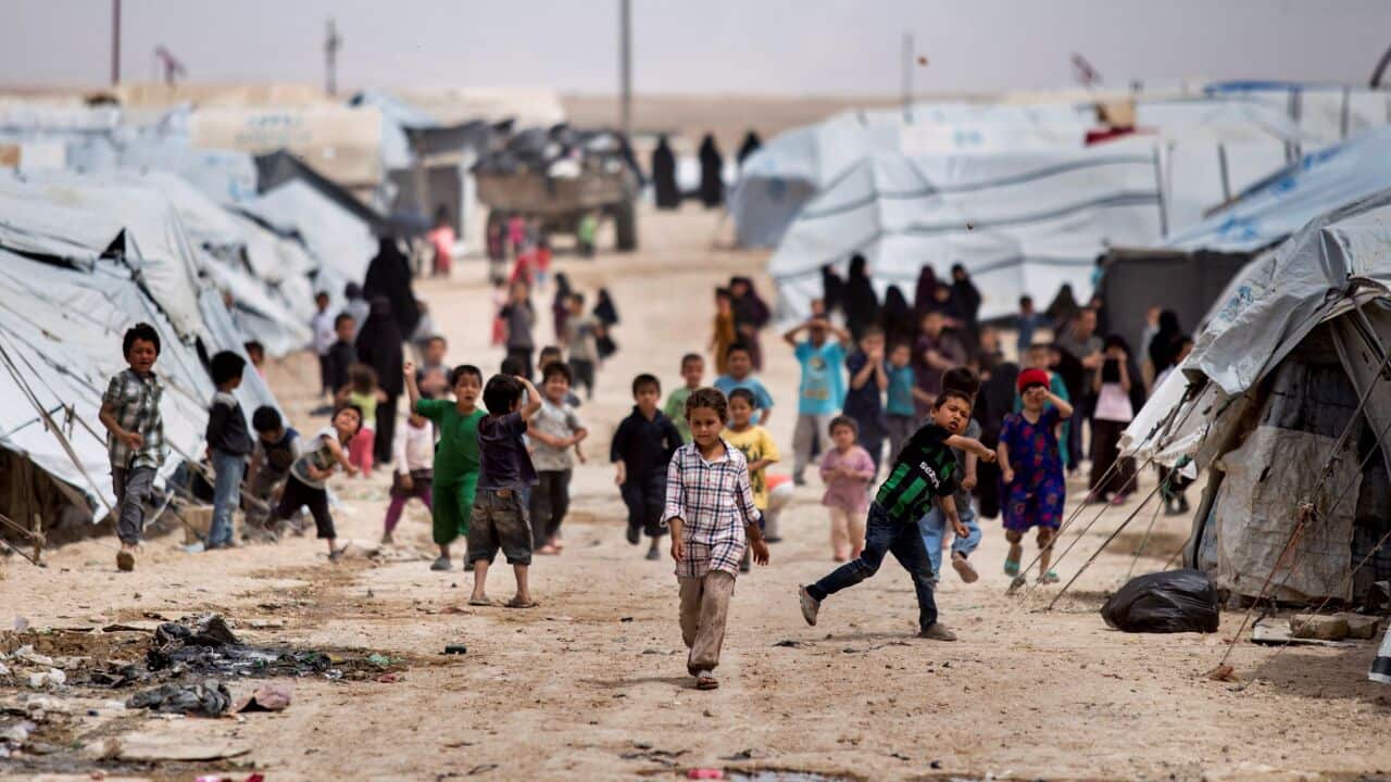 Children gather outside their tents, at al-Hol camp, which houses families of members of the Islamic State group, in Hasakeh province, Syria.