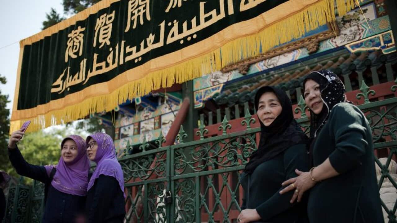 Chinese Muslims visit Niujie mosque during Eid al-Fitr in Beijing