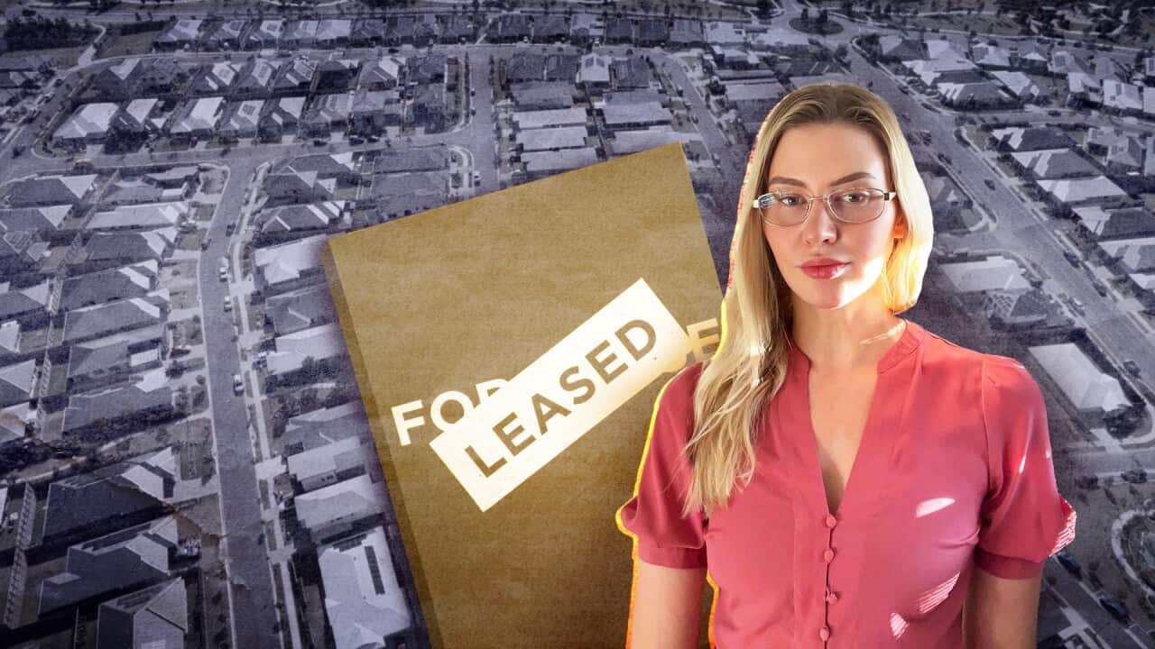 A woman in front of a for lease sign