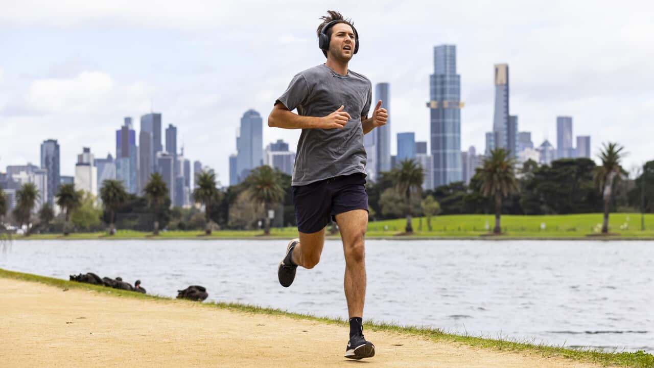 A person is seen exercising at Albert Park Lake in Melbourne, Monday October 4, 2021