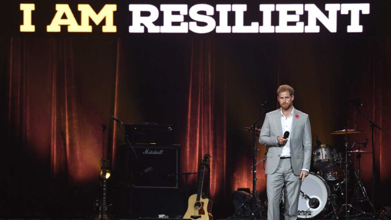 Prince Harry Duke of Sussex on stage at the Closing Ceremony of the Invictus Games 2018 at the Olympic Park, Sydney. Photo credit should read: Doug Peters/EMPICS.