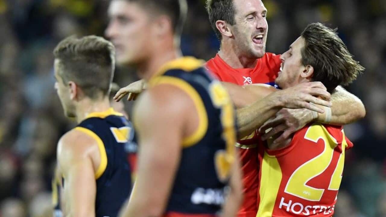 Michael Barlow and David Swallow celebrate.
