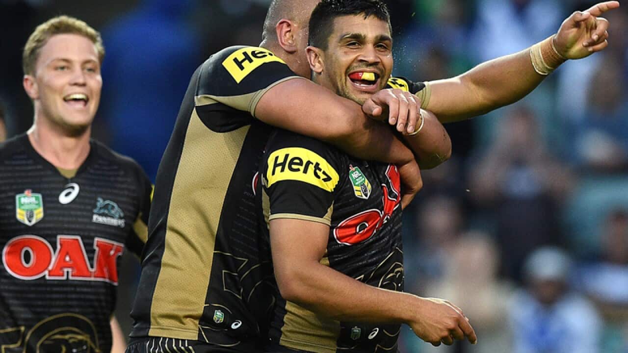 Tyrone Peachey of the Panthers celebrates with teammates