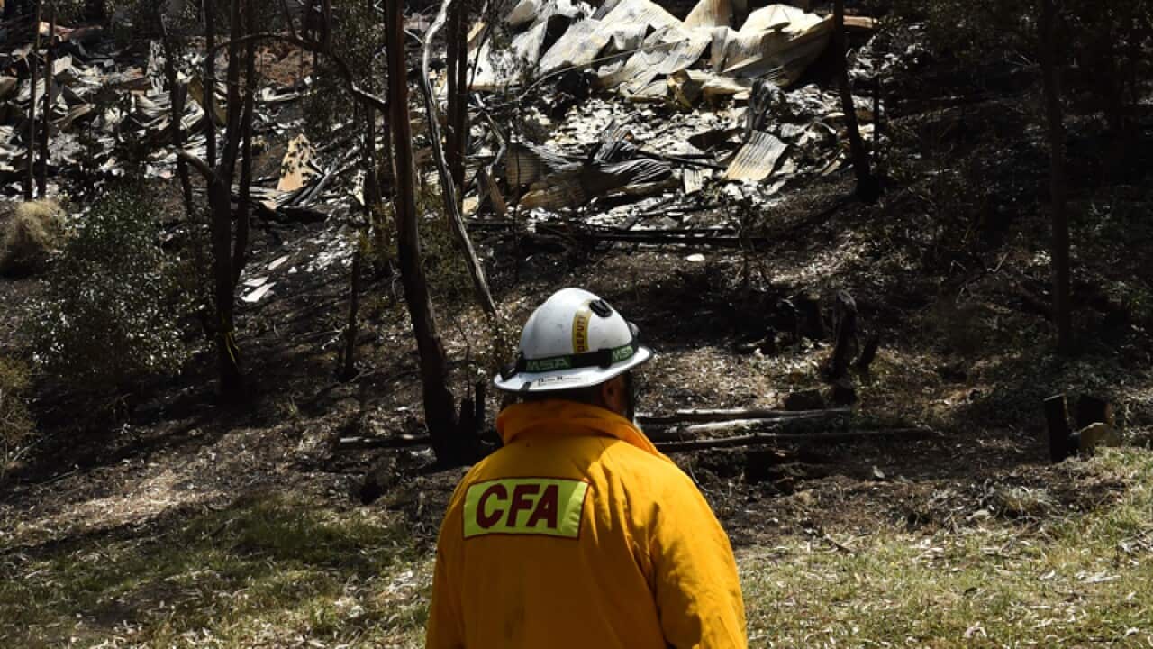Emergency services workers survey damaged buildings south of Melbourne