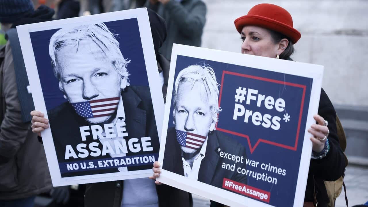 People holding signs during a protest