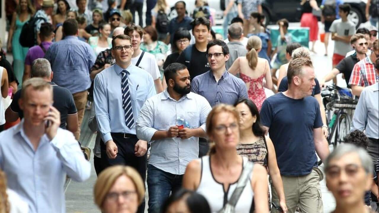Shoppers are seen in the Queen Street Mall.