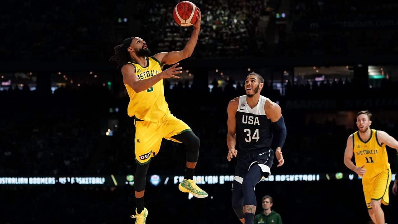 Patty Mills of Australia drives to the basket during match 2 of the Pre-FIBA World Cup series between Australia and the USA.