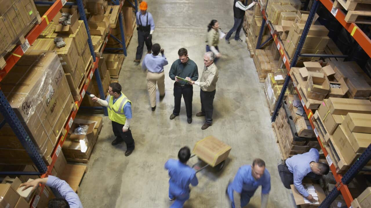 People Working in Warehouse