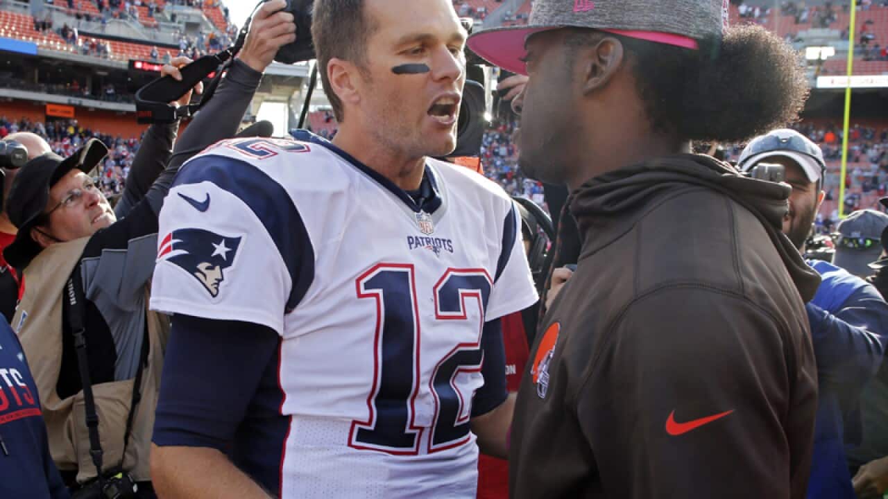 Patriots' Tom Brady (12) and Browns' Robert Griffin III