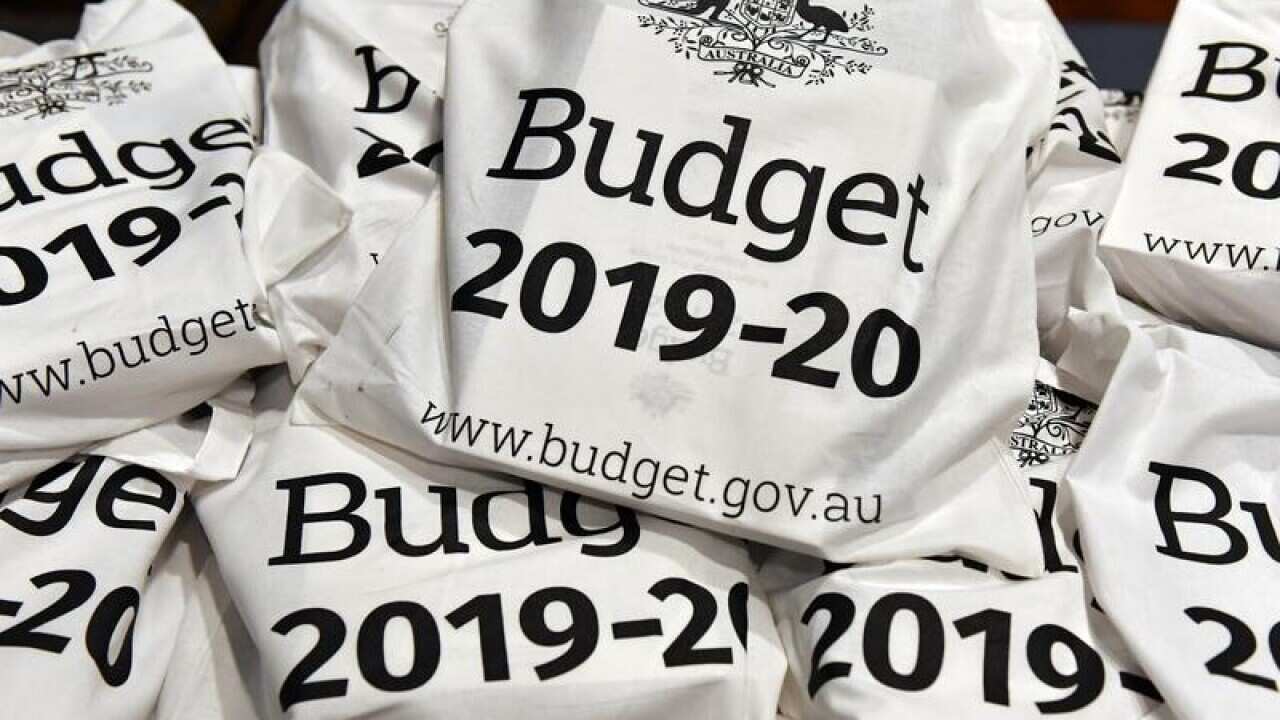 The Budget papers are seen during the 2019 Budget Lockup .