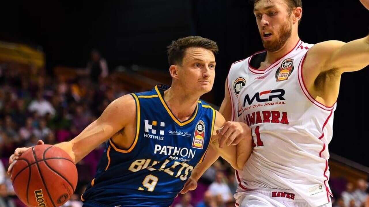 Shaun Bruce of the Bullets drives to basket during the round five NBL.