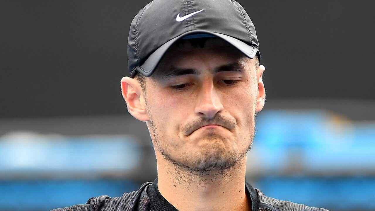 Bernard Tomic of Australia reacts against Lorenzo Sonego of Italy during qualifying round 3 for the Australian Open tennis tournament, Sunday, January 14, 2018.