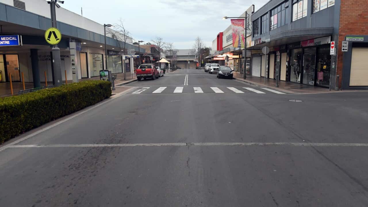 An empty street in the shopping district is seen in the southwestern suburb of Fairfield in Sydney