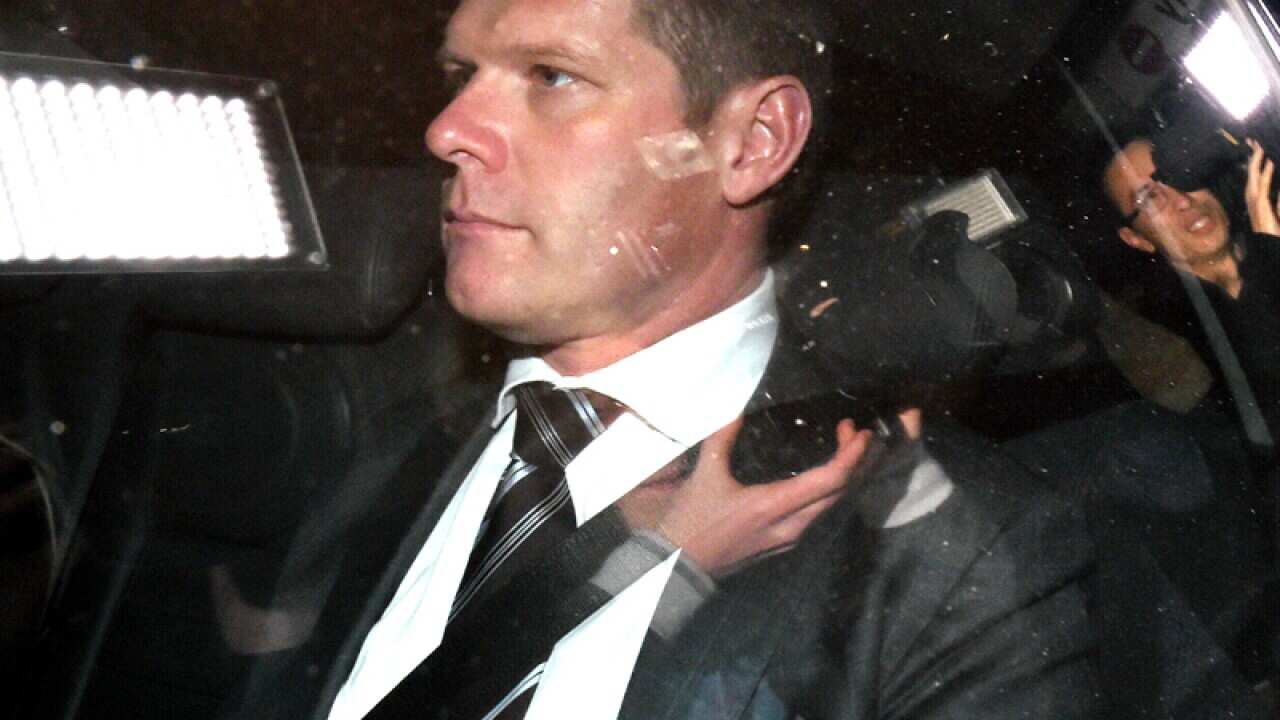 Andrew Cornwell departs after giving evidence at the ICAC