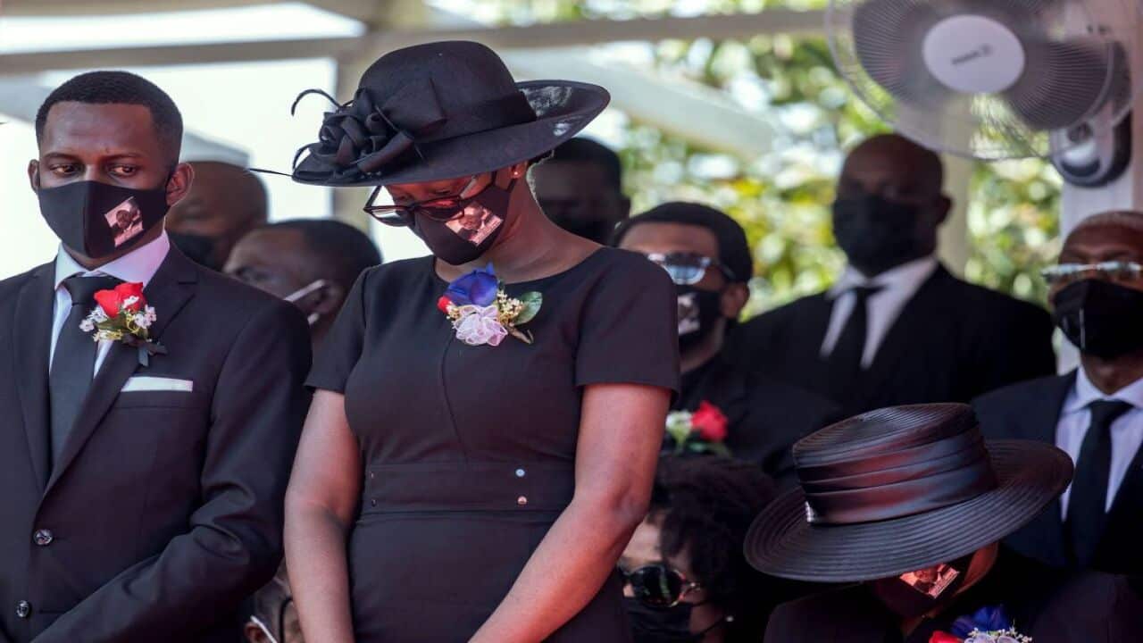 Joverlain Moise, Jomarlie Moise and Martine Mose attend the funeral of slain Haitian President Jovenel Mose, on 23 July, 2021, in Cap-Haitien, Haiti.