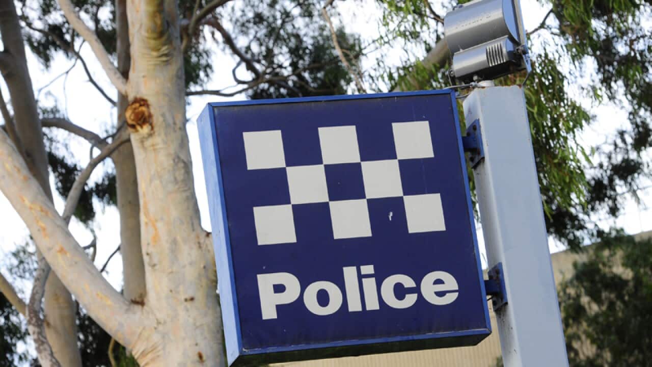 A police station sign