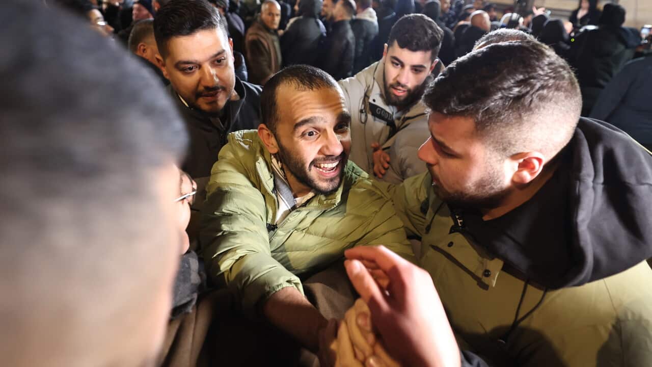 Israel releases Palestinian prisoners after Hamas returns bodies of four hostages | SBS News
